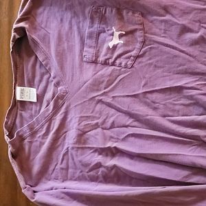 Pink long sleeve t shirt. V neck. Size medium. Maroon in color great condition.